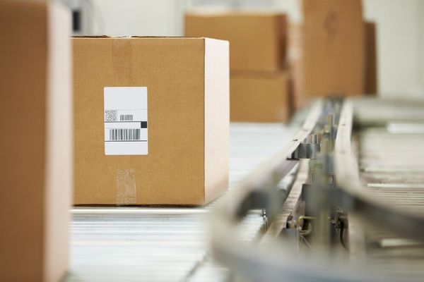 Komissionierung pro Bereich und wegeoptimierte Wagenaufteilung